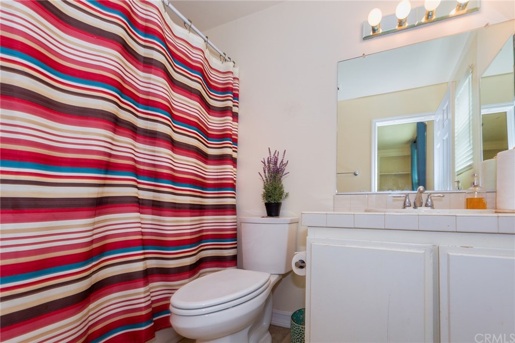 3834 Sky View Lane La Crescenta, CA 91214 - Photo 19 of 38 a bathroom with a sink toilet and shower