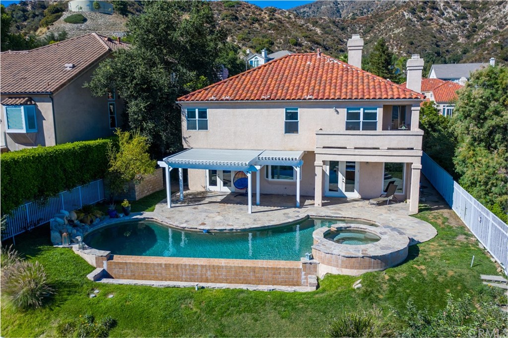 3834 Sky View Lane La Crescenta, CA 91214 - Photo 33 of 38 an aerial view of a house with swimming pool garden view and a garden