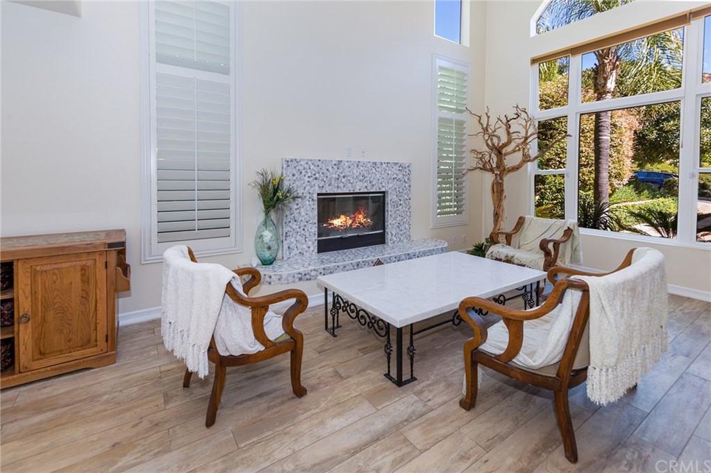 3834 Sky View Lane La Crescenta, CA 91214 - Photo 8 of 38 a living room with furniture and a fireplace