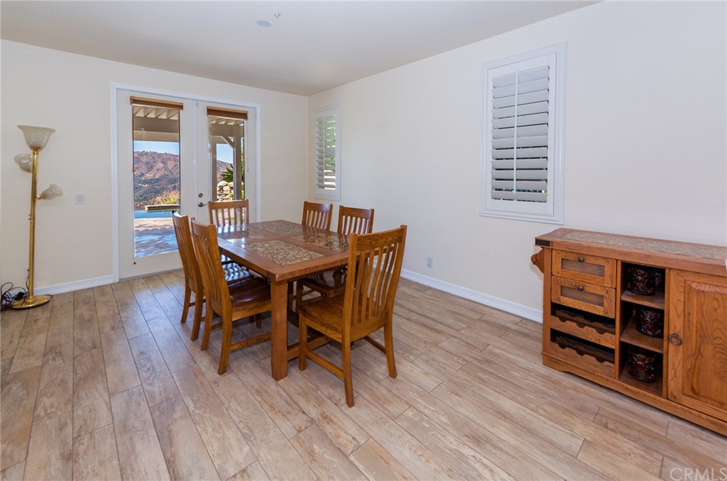 3834 Sky View Lane La Crescenta, CA 91214 - Photo 9 of 38 a view of a dining room with furniture and wooden floor