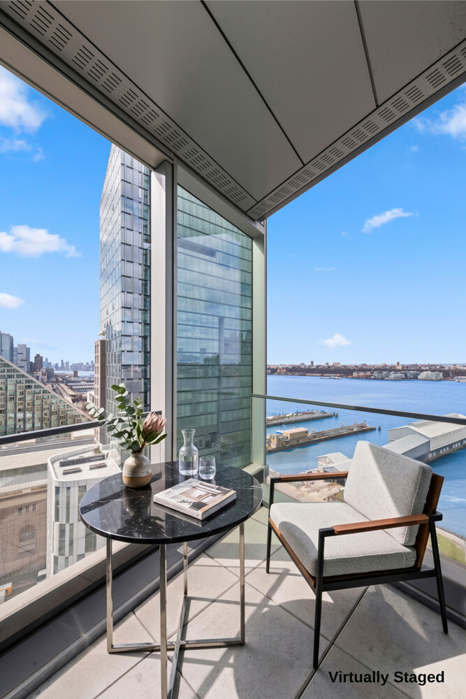 30 Riverside Boulevard, Unit 21M Manhattan, NY 10069 - Photo 3 of 38 a view of a terrace with furniture