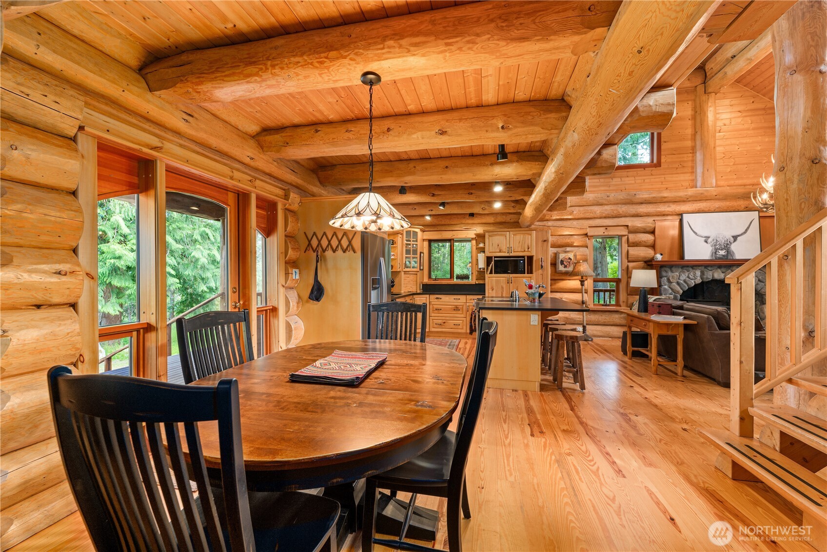 134 Sacred Moon Way Friday Harbor, WA 98250 - Photo 14 of 35 a view of a dining room with furniture window and outside view