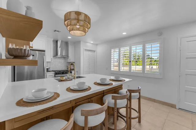 a view of a dining room with furniture