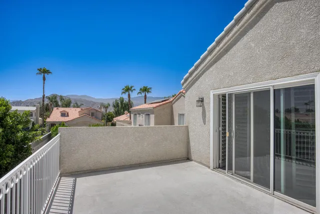 a view of a house with a balcony