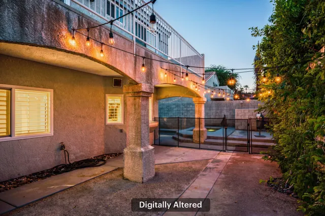 a view of a building with sitting area