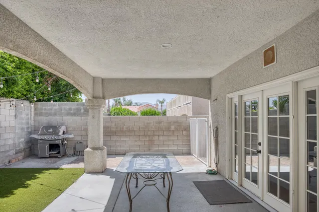 a view of outdoor space yard deck patio and outdoor kitchen