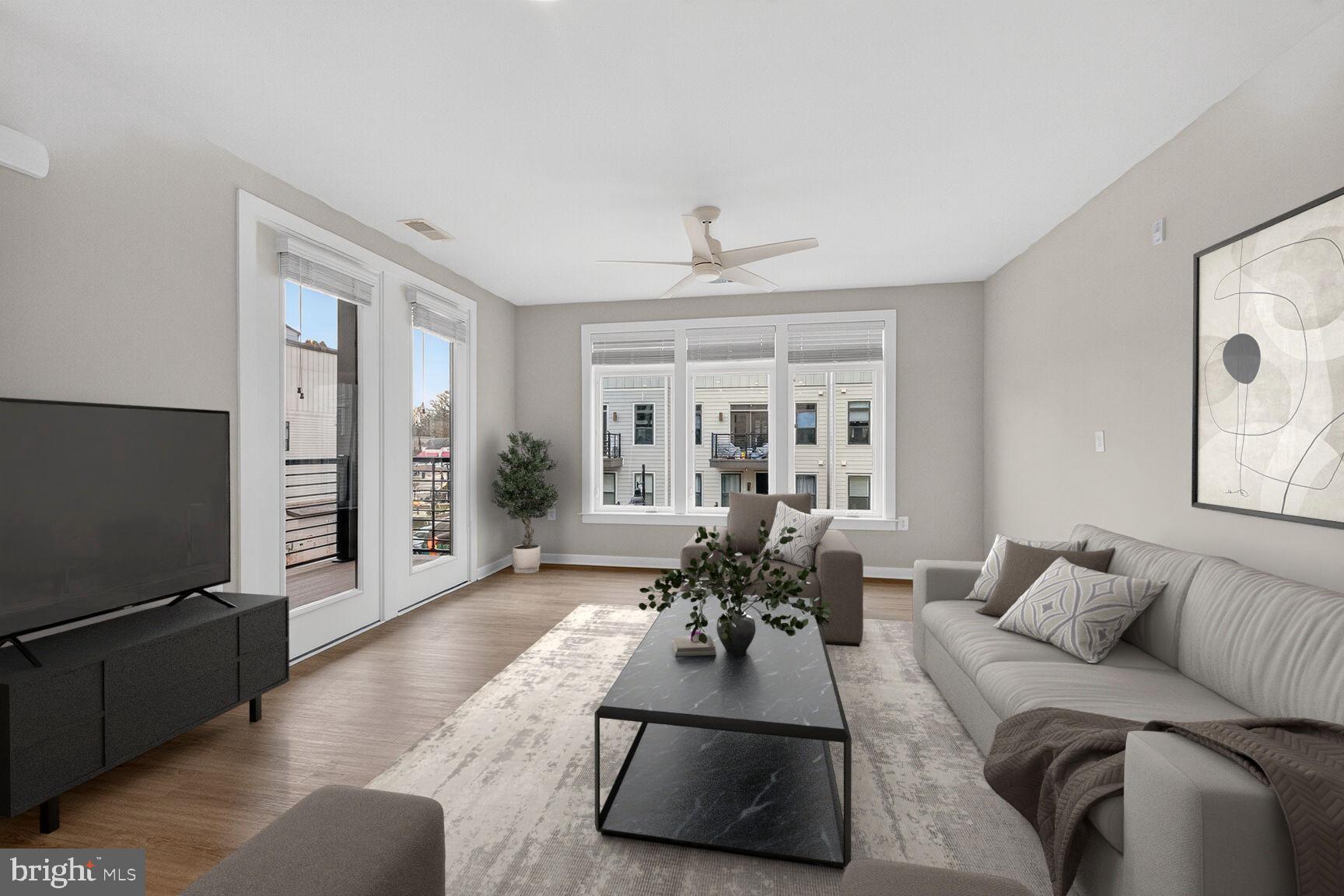 Bright and airy living space (virtually staged).