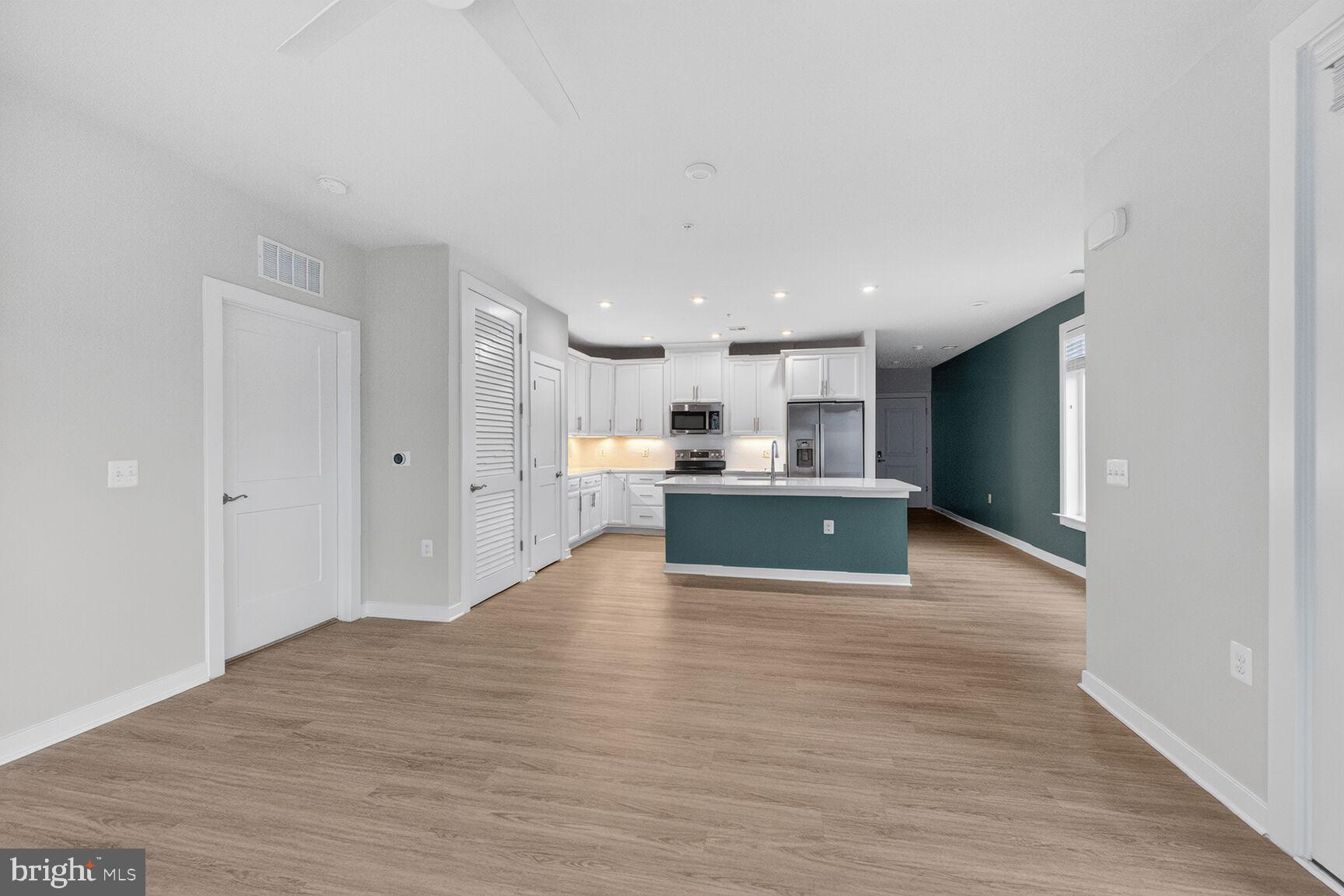 1669 Bandit Loop, Unit 301A Reston, VA 20190 - Photo 12 of 30 Modern open space with stylish finishes.