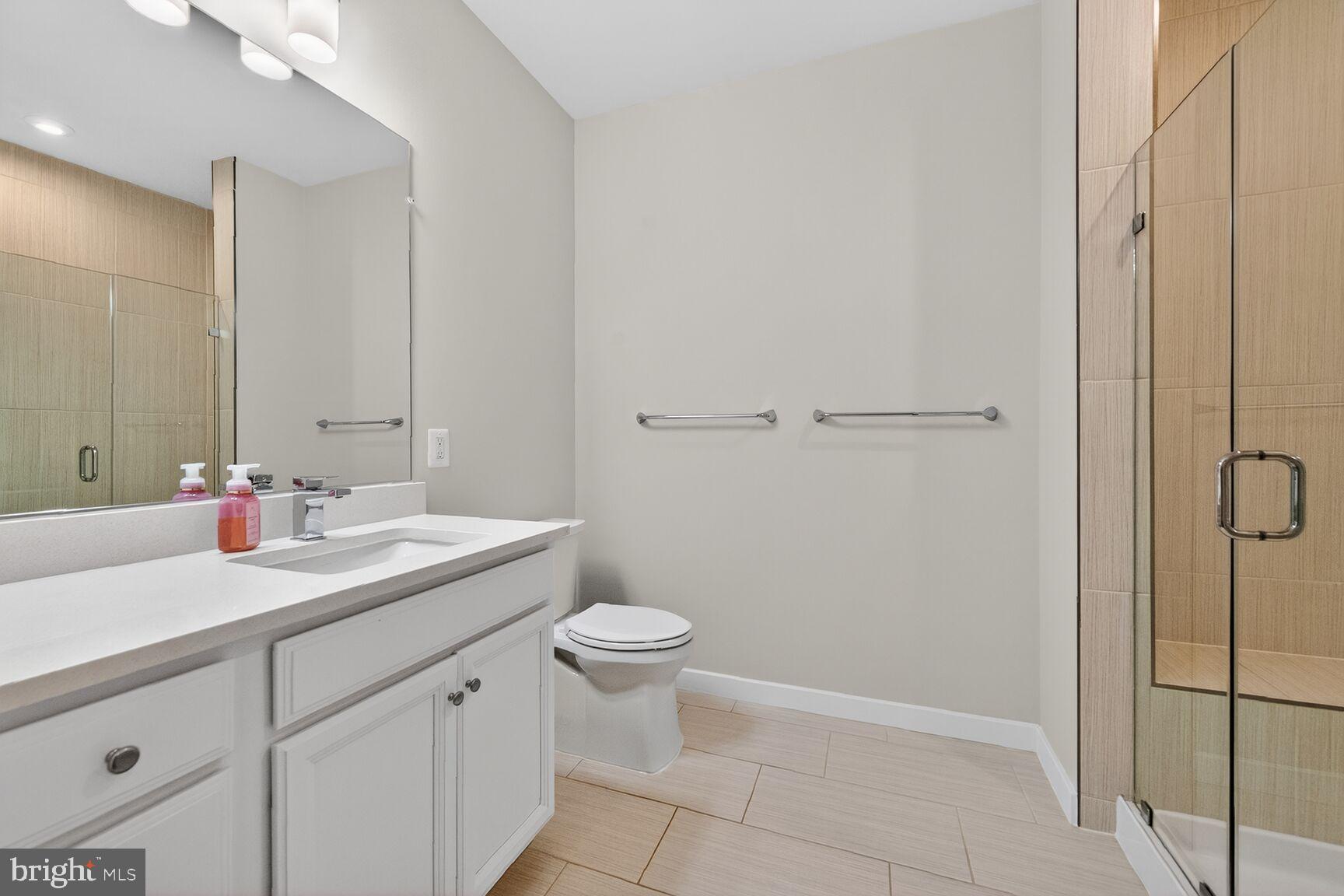 1669 Bandit Loop, Unit 301A Reston, VA 20190 - Photo 23 of 30 Modern bathroom with sleek finishes.