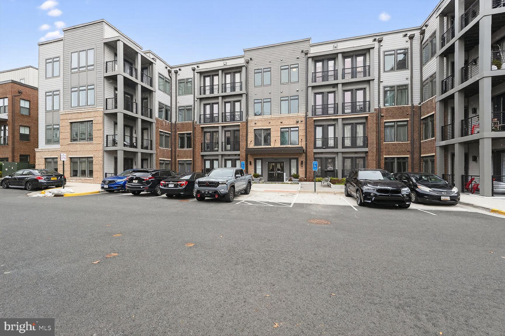 1669 Bandit Loop, Unit 301A Reston, VA 20190 - Photo 27 of 30 Modern apartment complex with ample parking.