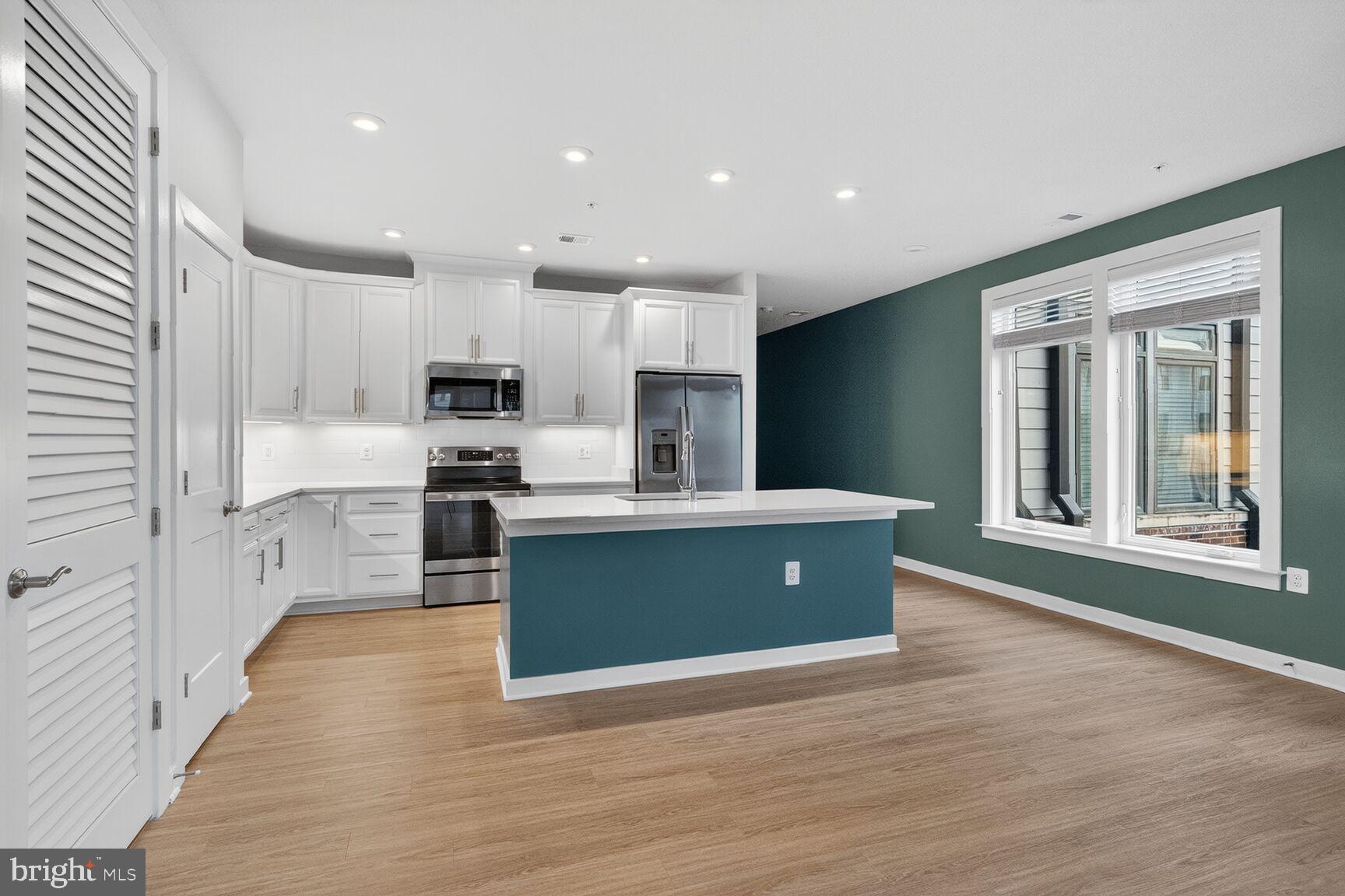1669 Bandit Loop, Unit 301A Reston, VA 20190 - Photo 5 of 30 Modern kitchen with stylish accents.