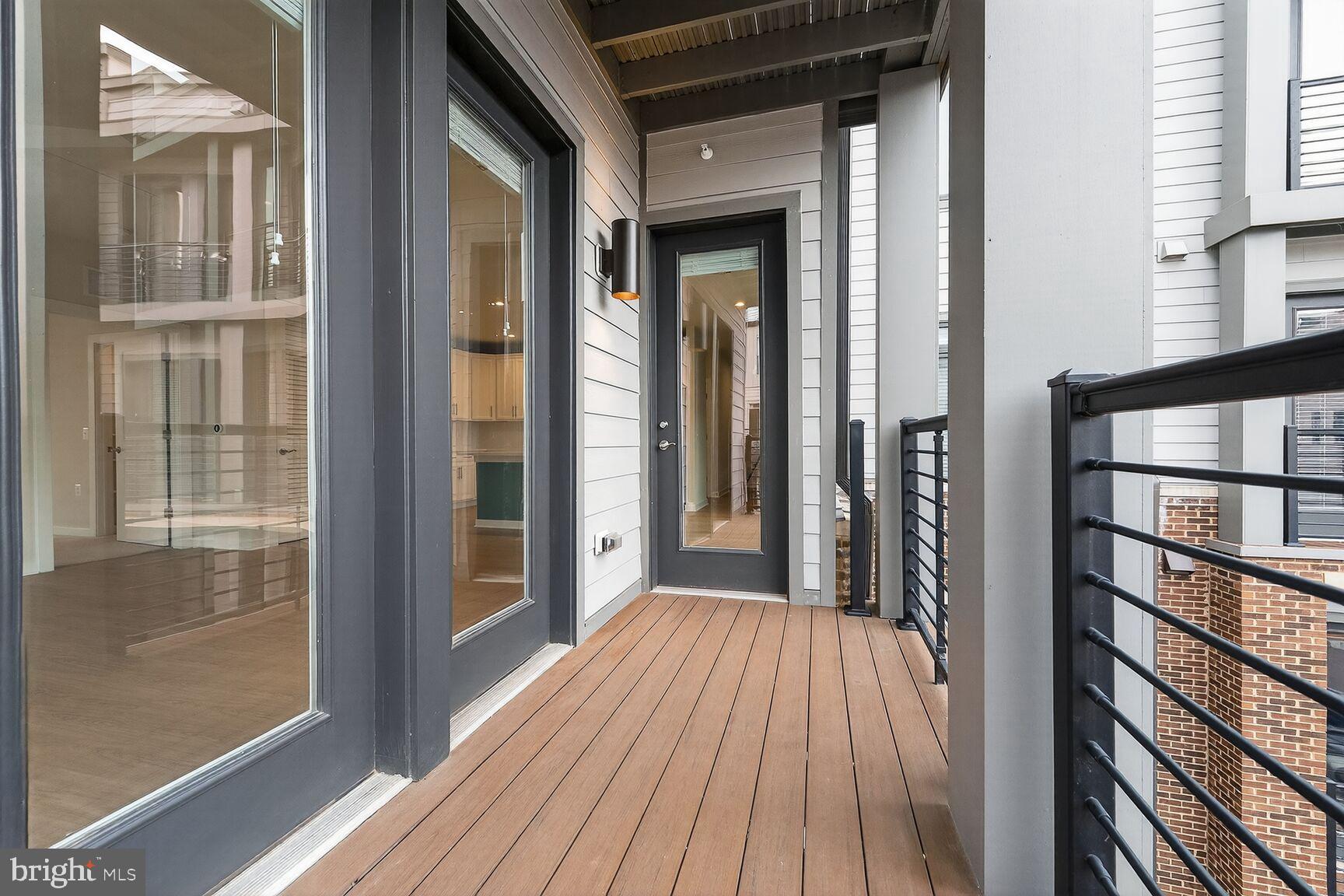 1669 Bandit Loop, Unit 301A Reston, VA 20190 - Photo 6 of 30 Modern balcony with sleek design elements.