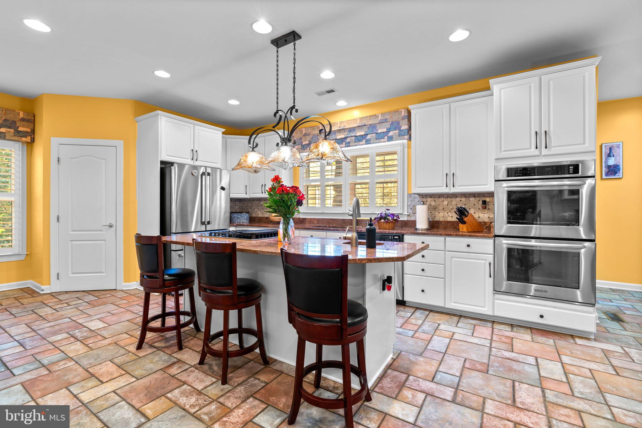 8061 Hunterbrooke Lane Fulton, MD 20759 - Photo 12 of 77 Center Island with Cooktop.