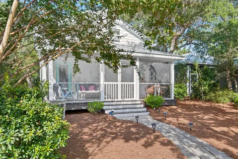 a view of a deck with a white fence