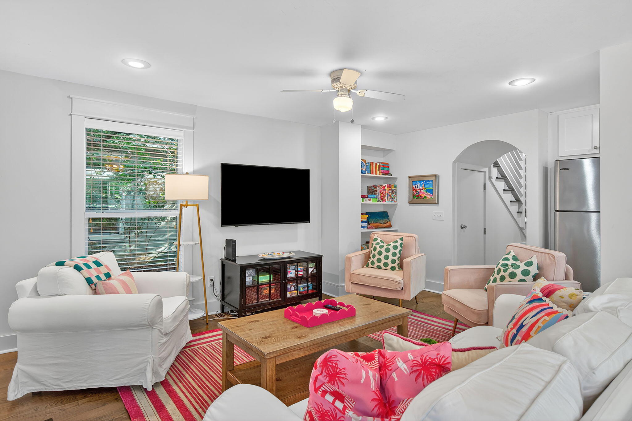 335 San Juan Avenue Santa Rosa Beach, FL 32459 - Photo 10 of 39 a living room with furniture and a flat screen tv