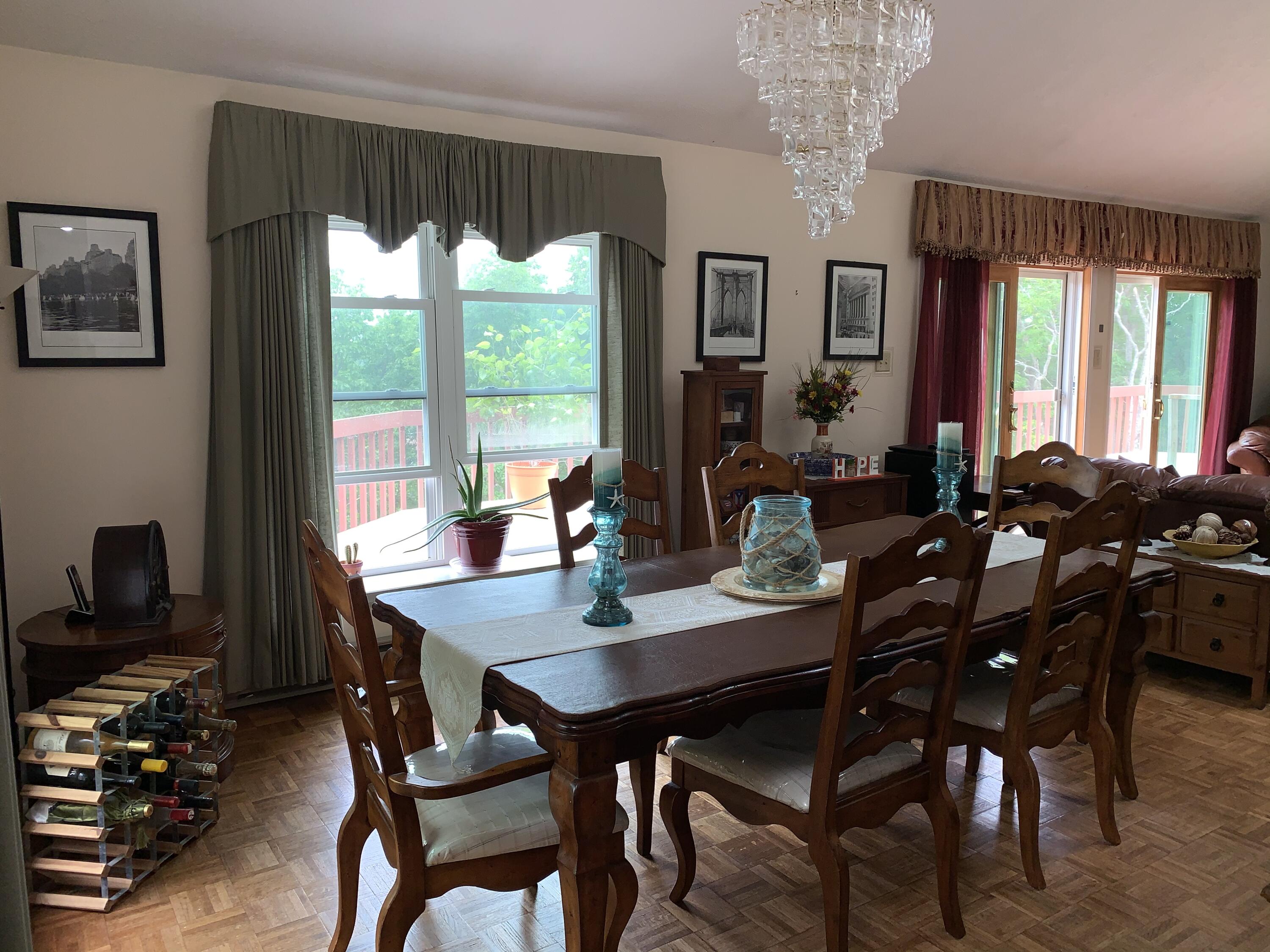 3205 Ely Court Bushkill, PA 18324 - Photo 15 of 80 a view of a dining room with furniture window and outside view
