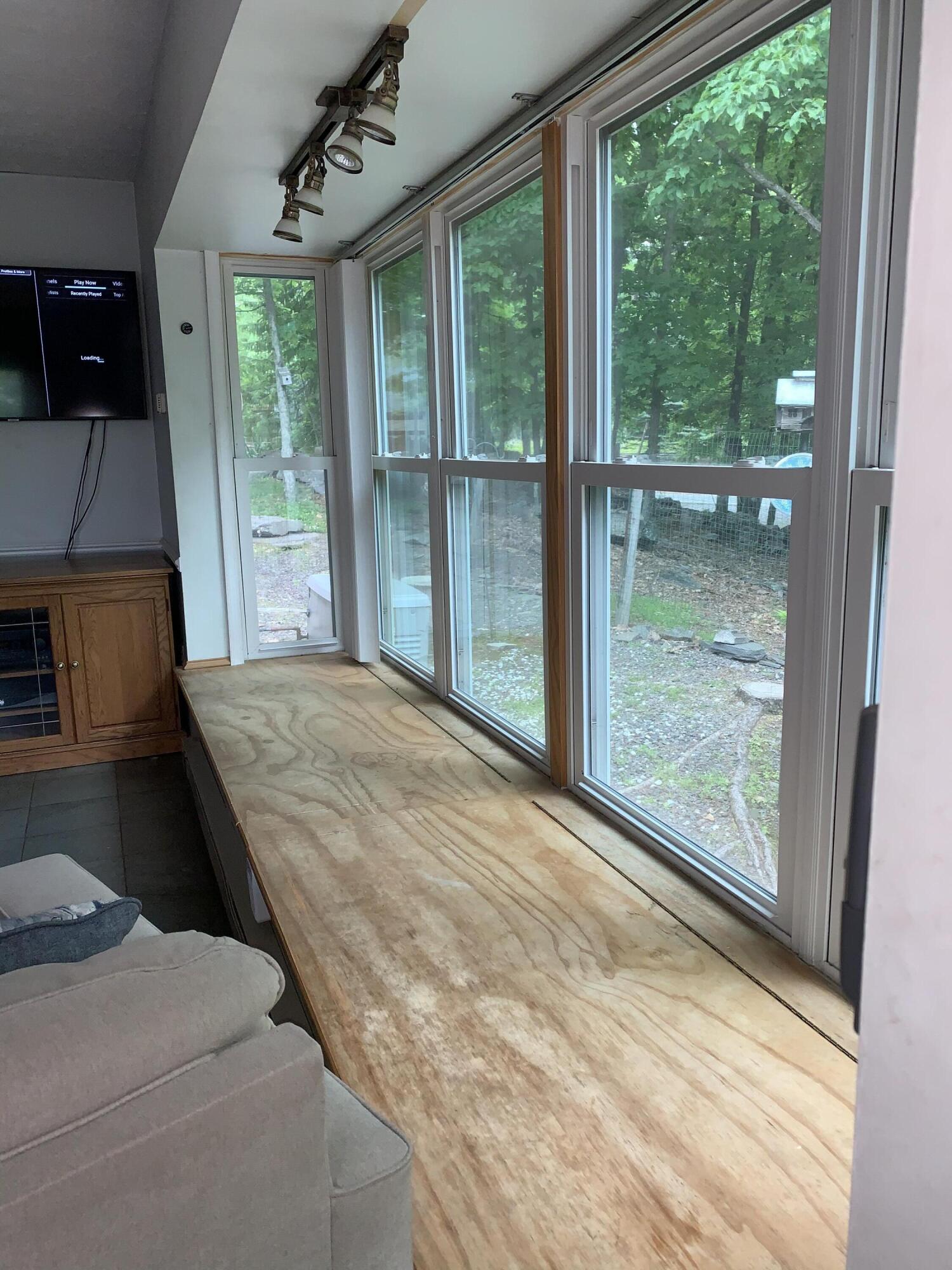 3205 Ely Court Bushkill, PA 18324 - Photo 24 of 80 a bedroom with a bed and large window