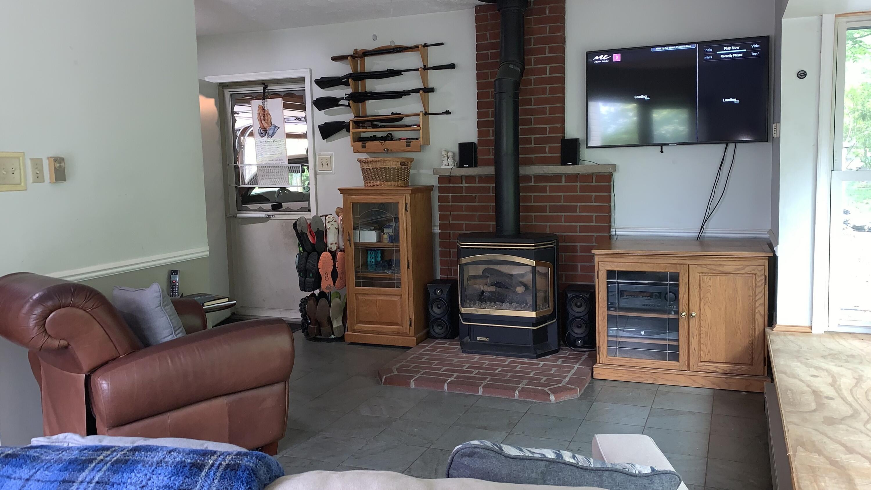 3205 Ely Court Bushkill, PA 18324 - Photo 26 of 80 a living room with furniture and a fireplace