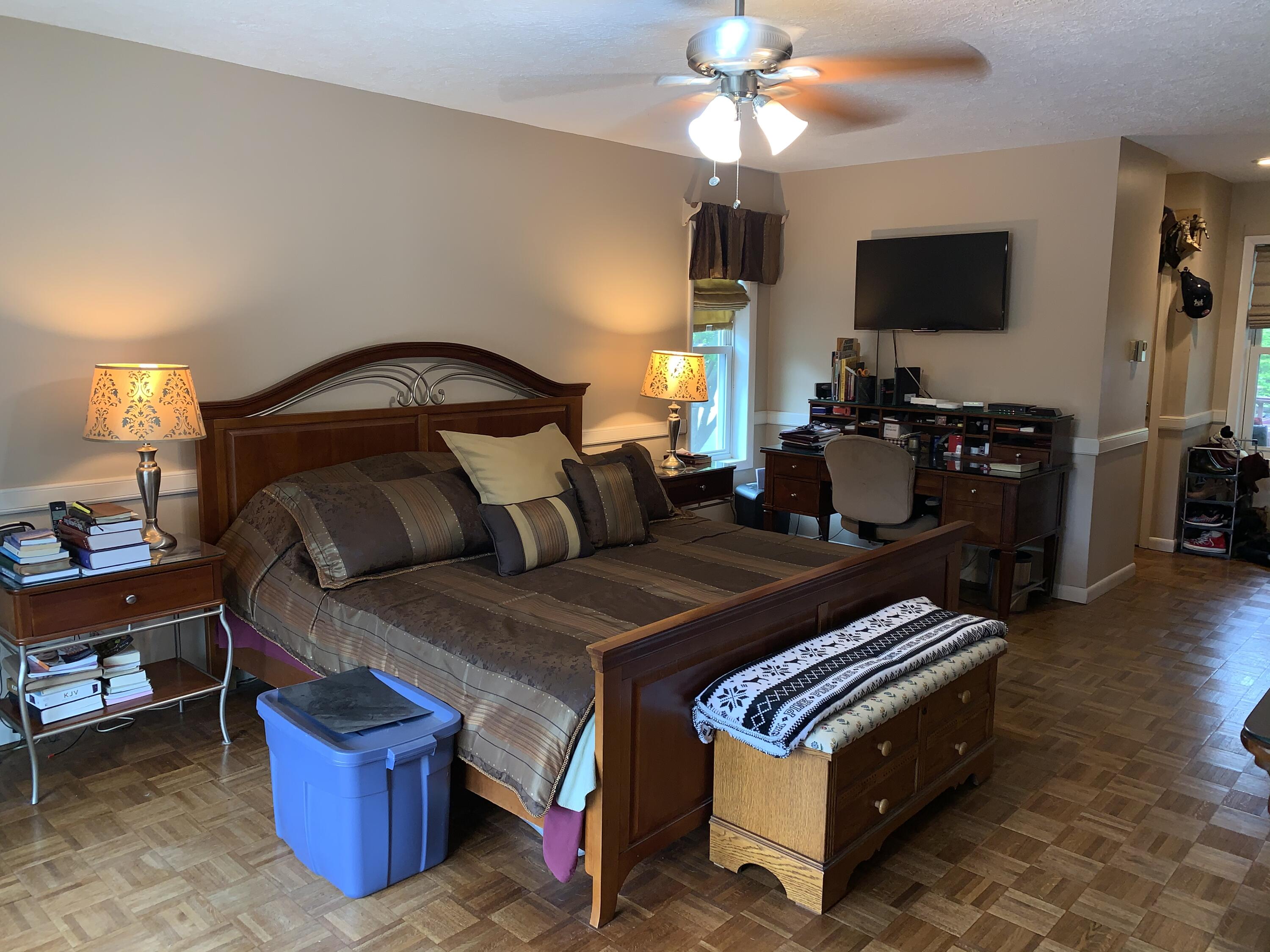 3205 Ely Court Bushkill, PA 18324 - Photo 32 of 80 a bedroom with a bed and a flat tv screen on dresser
