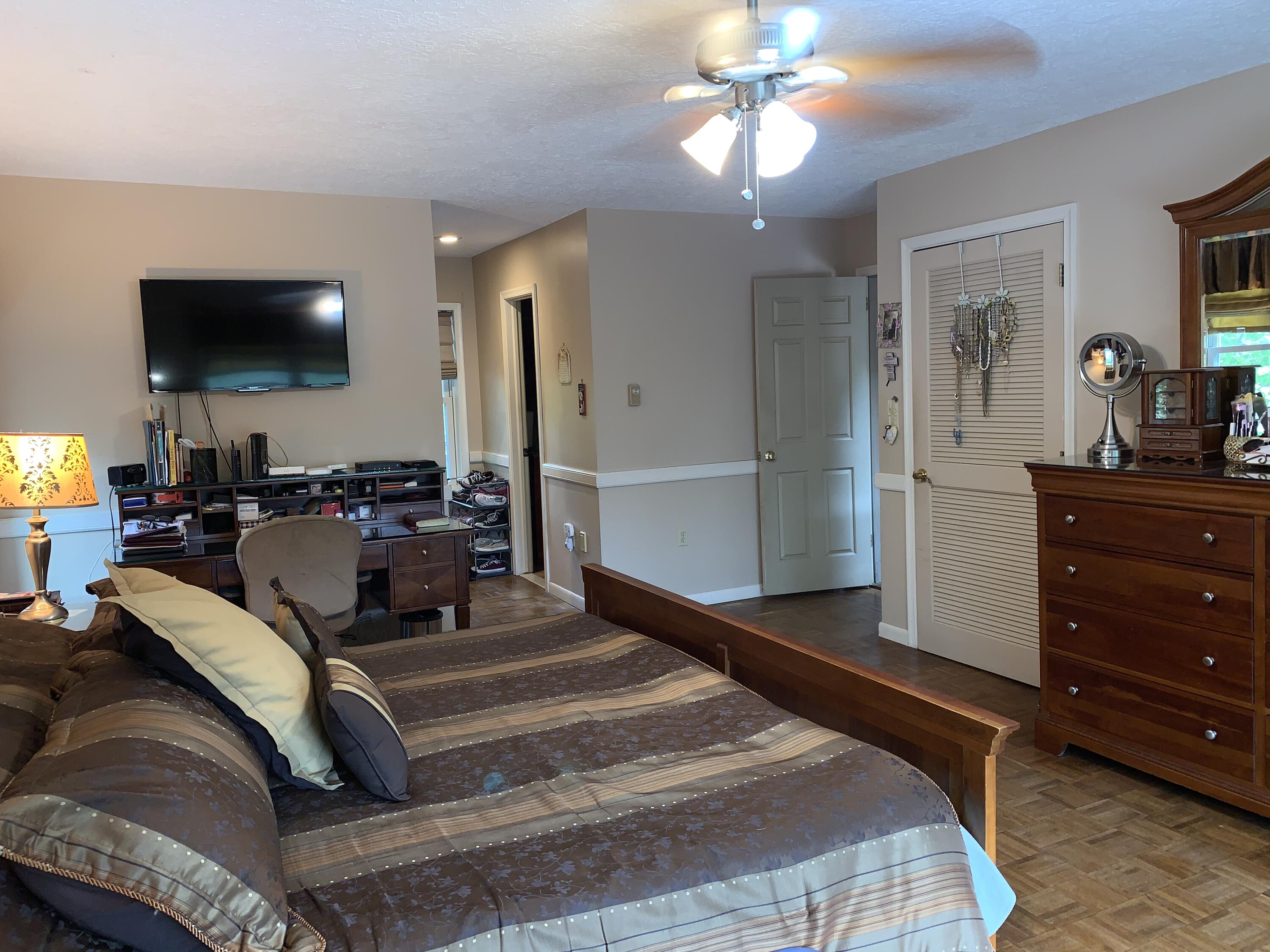 3205 Ely Court Bushkill, PA 18324 - Photo 35 of 80 a bedroom with a bed and flat screen tv