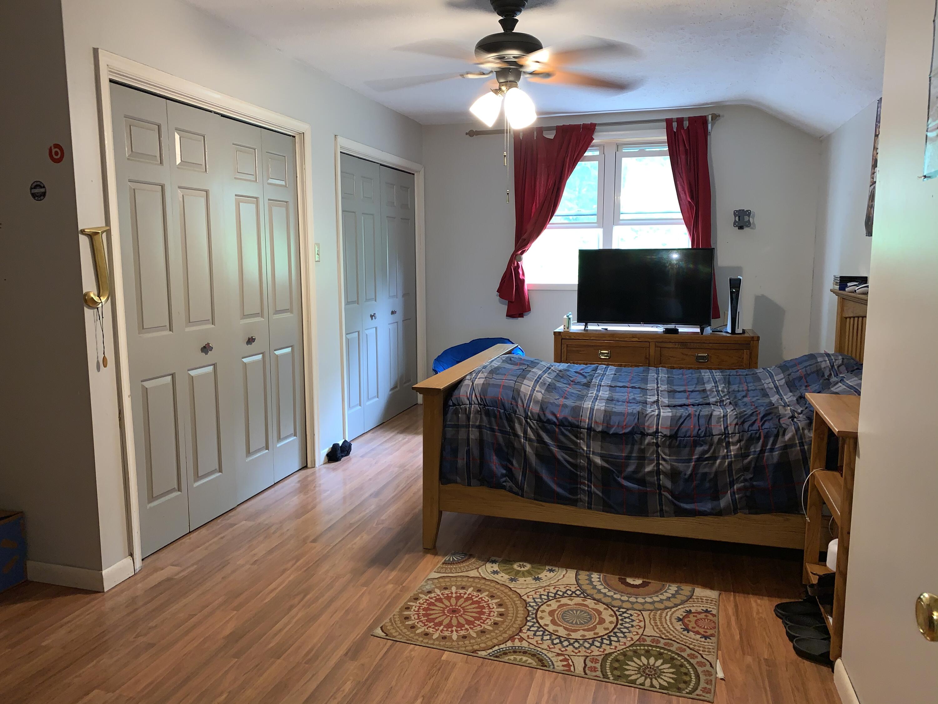 3205 Ely Court Bushkill, PA 18324 - Photo 43 of 80 a bedroom with a bed and a flat screen tv