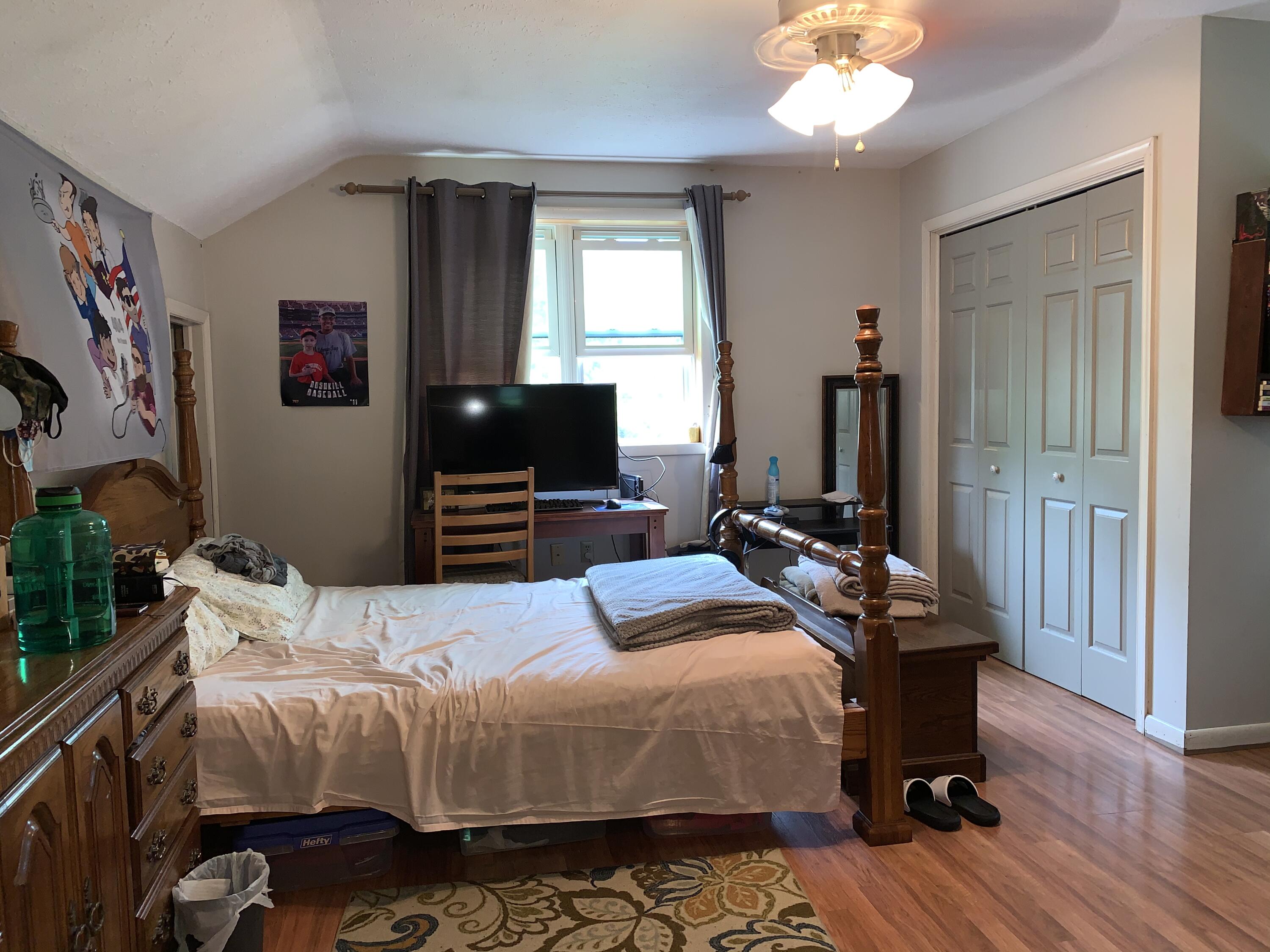 3205 Ely Court Bushkill, PA 18324 - Photo 45 of 80 a bedroom with a bed and a flat screen tv