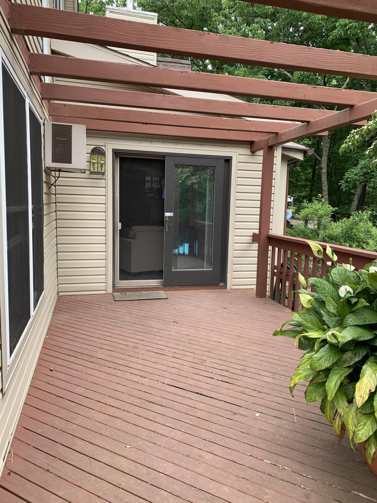 3205 Ely Court Bushkill, PA 18324 - Photo 53 of 80 a view of a house with a porch