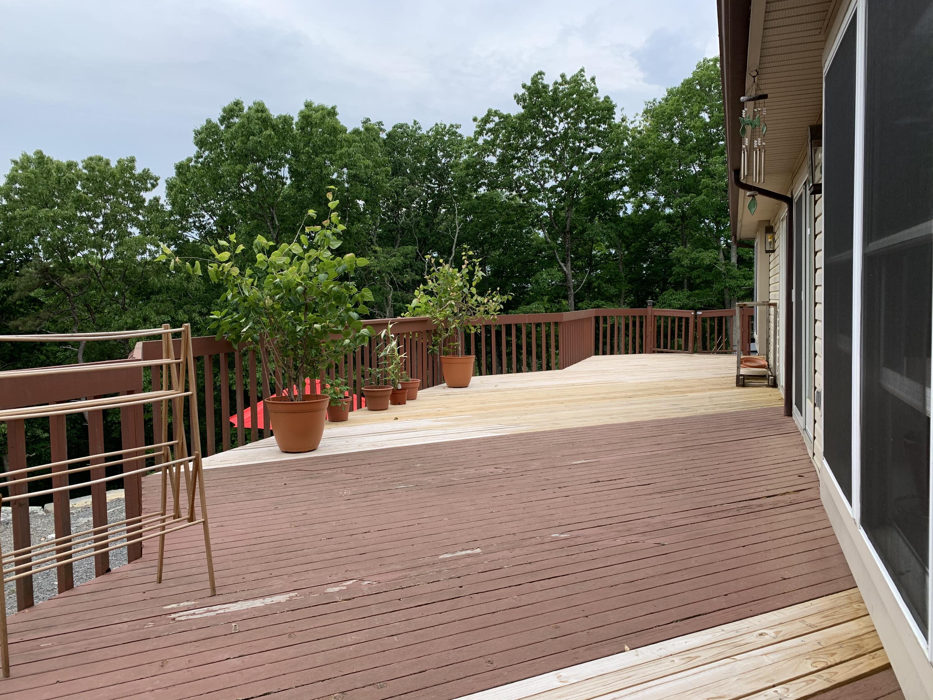 3205 Ely Court Bushkill, PA 18324 - Photo 54 of 80 a swimming pool with seating space and trees in the background