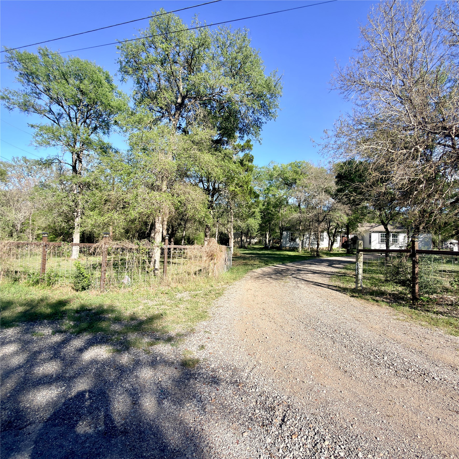 127 Comanche Trail, Unit A Elgin, TX 78621 - Photo 26 of 33 View of dirt / gravel driveway