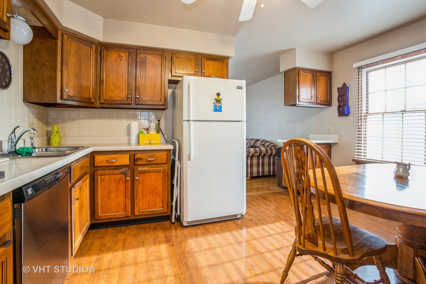 310 South Oltendorf Road Streamwood, IL 60107 - Photo 4 of 13 a kitchen with stainless steel appliances granite countertop a refrigerator a sink a stove and island