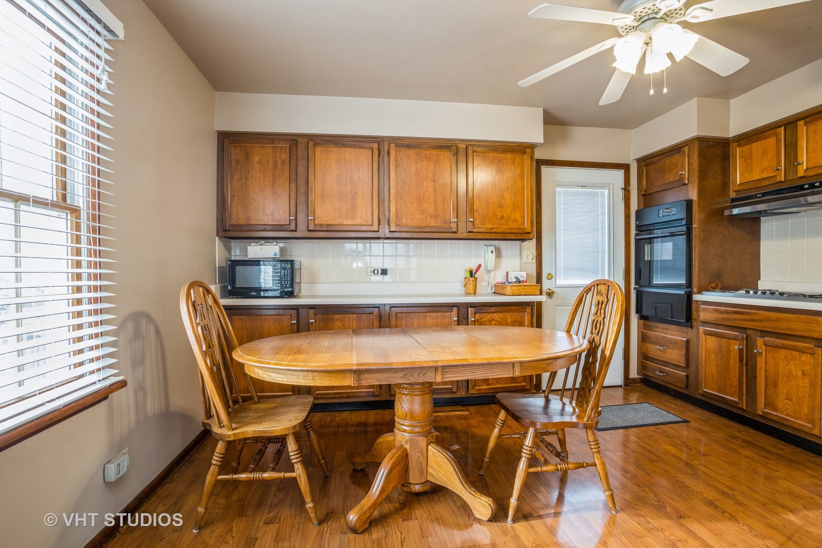 310 South Oltendorf Road Streamwood, IL 60107 - Photo 5 of 13 a view of a dining room with furniture and chandelier