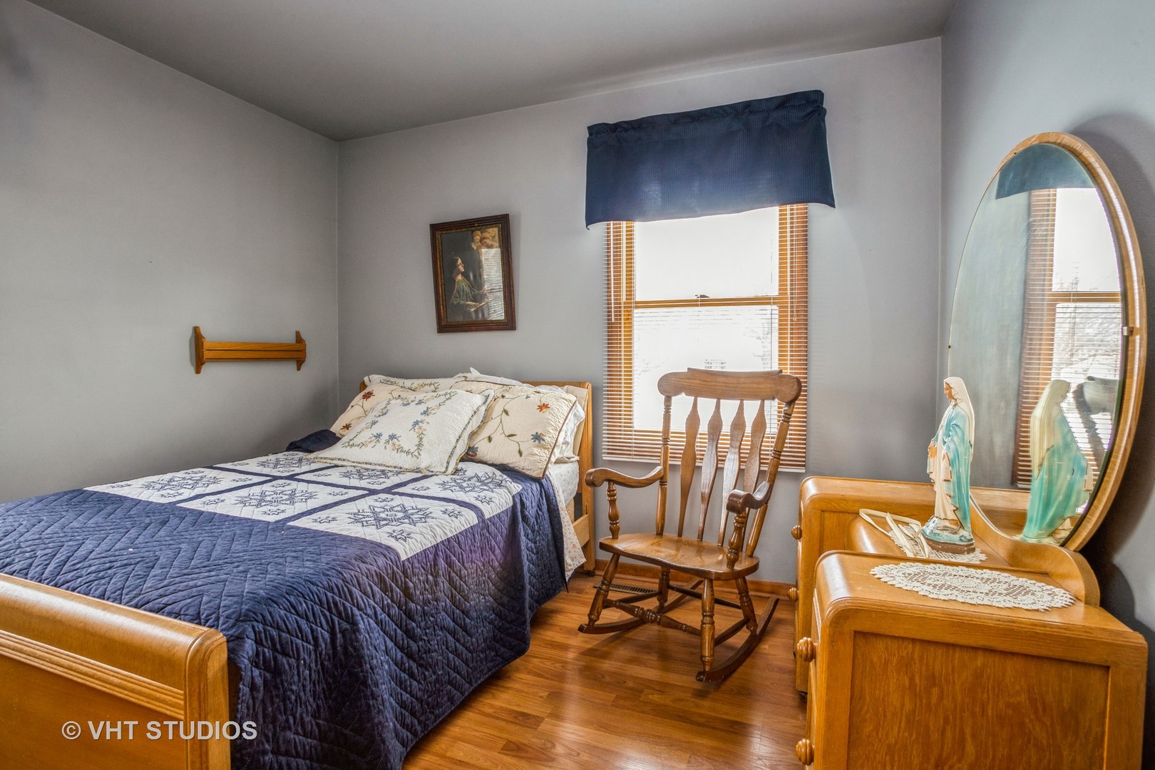 310 South Oltendorf Road Streamwood, IL 60107 - Photo 6 of 13 a bed room with a bed and a chair