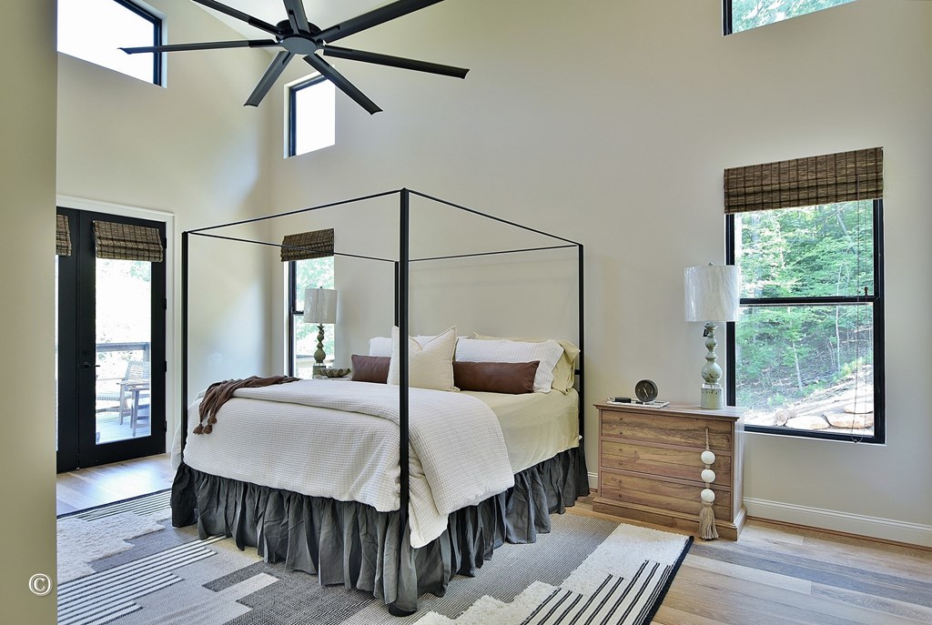 299 Coldiviees Road Hamilton, GA 31811 - Photo 17 of 55 a bedroom with a bed and wooden floor