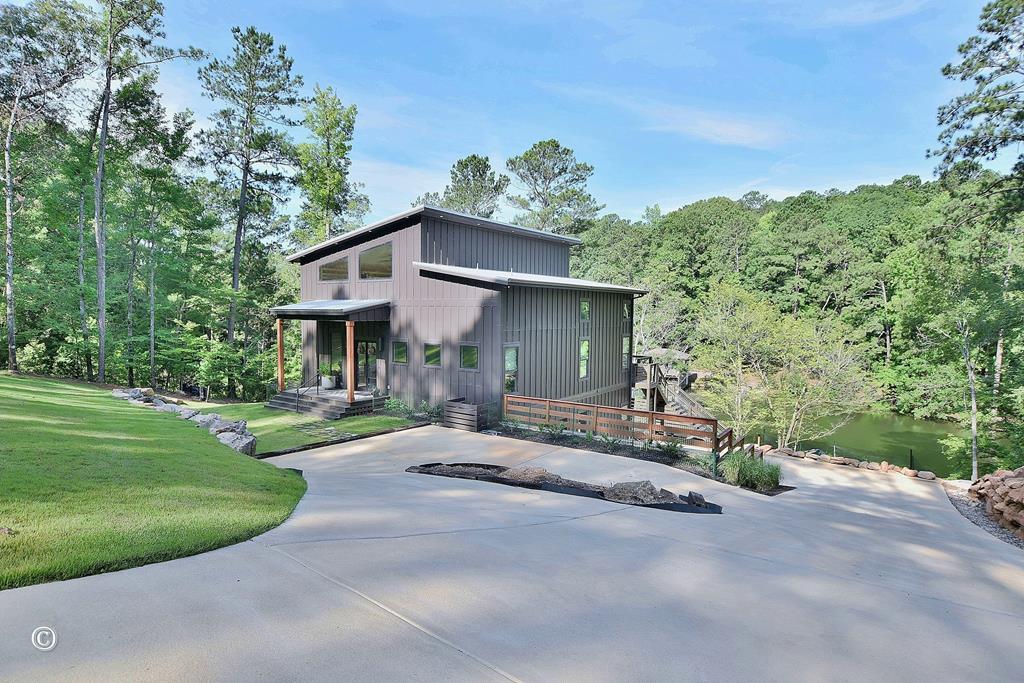 299 Coldiviees Road Hamilton, GA 31811 - Photo 2 of 55 a view of a house with a yard and tree s