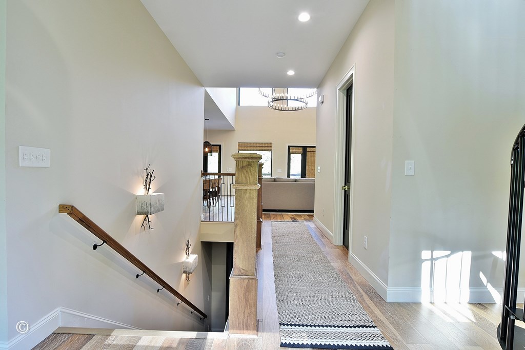 299 Coldiviees Road Hamilton, GA 31811 - Photo 23 of 55 a view of a hallway with wooden floor and staircase