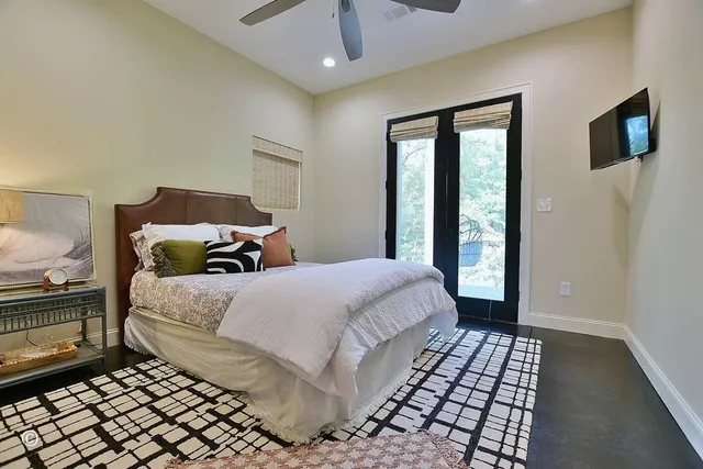 a view of staircase with wooden floor and windows