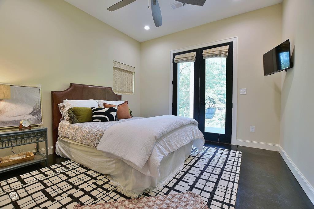 299 Coldiviees Road Hamilton, GA 31811 - Photo 29 of 55 a bedroom with double bed and a window