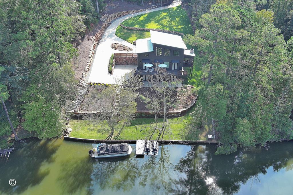 299 Coldiviees Road Hamilton, GA 31811 - Photo 3 of 55 an aerial view of a house with a yard