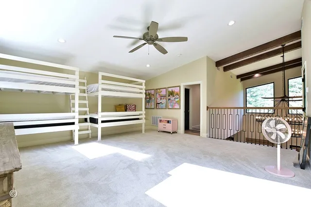 a view of living room with furniture and floor to ceiling window