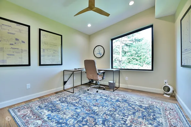 a view of balcony with furniture and wooden deck