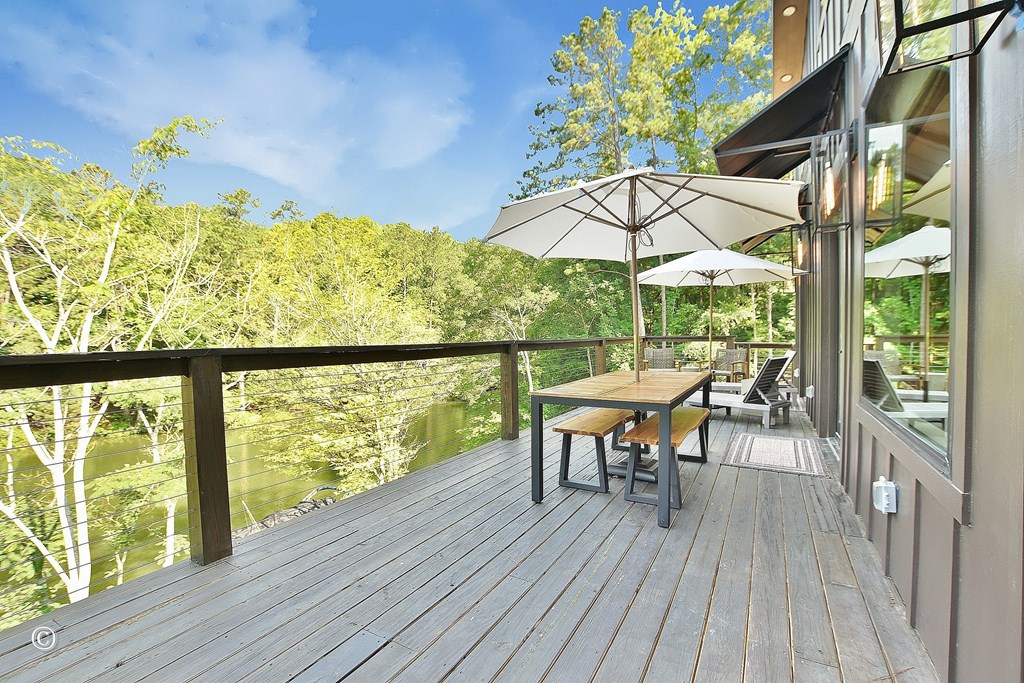 299 Coldiviees Road Hamilton, GA 31811 - Photo 37 of 55 a view of a chairs and table in the balcony
