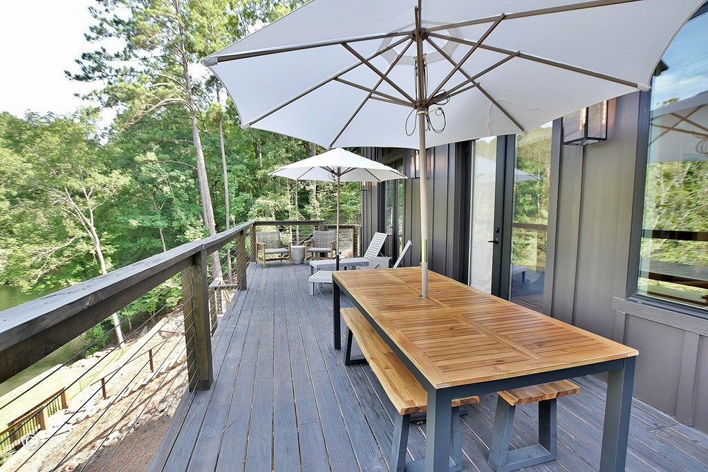 299 Coldiviees Road Hamilton, GA 31811 - Photo 38 of 55 a view of balcony with furniture and wooden deck