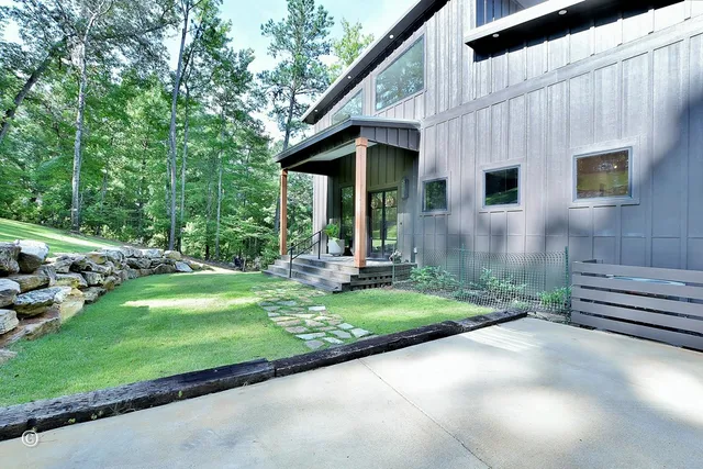 a view of a park with large trees