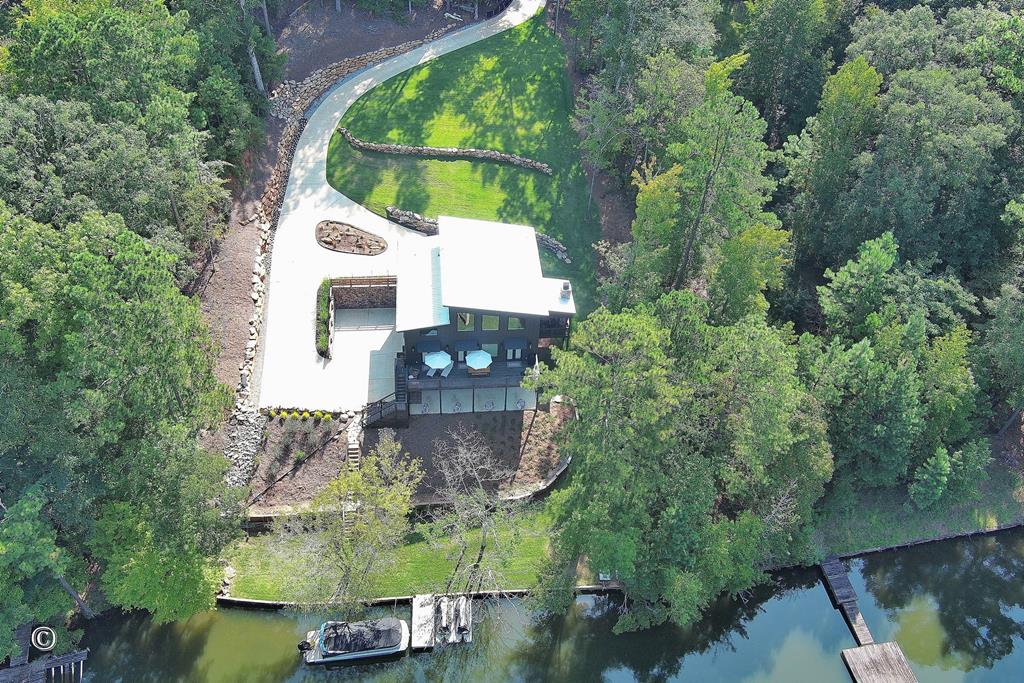 299 Coldiviees Road Hamilton, GA 31811 - Photo 52 of 55 an aerial view of house with yard swimming pool and outdoor seating