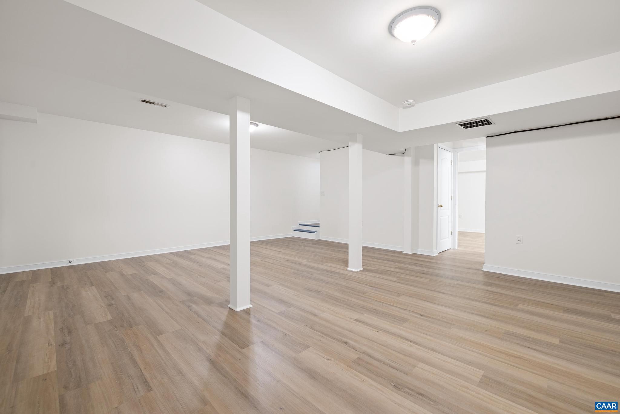 1075 Social Hall Road New Canton, VA 23123 - Photo 13 of 64 a view of a room with wooden floor