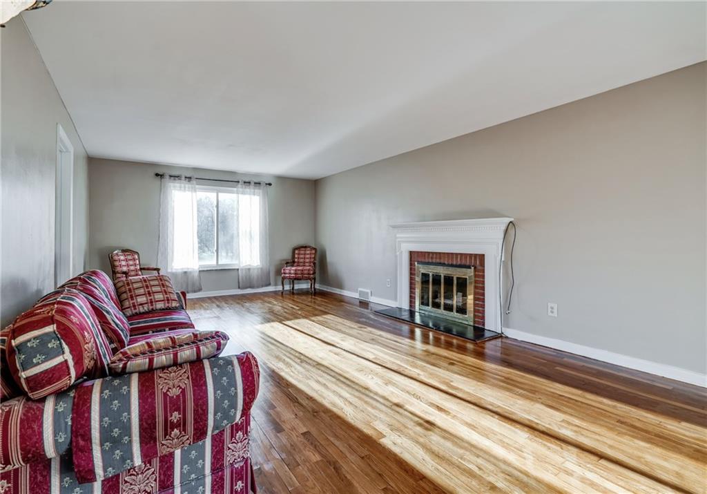 1601 Powers Run Road Pittsburgh, PA 15238 - Photo 13 of 25 Formal living room with fireplace.