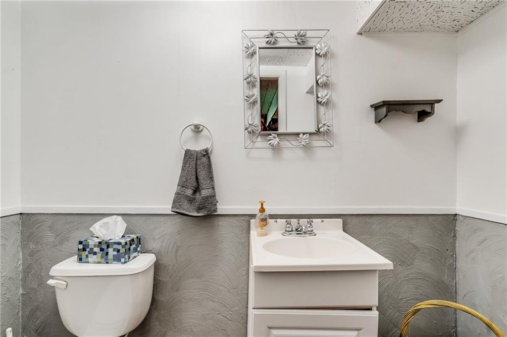 1601 Powers Run Road Pittsburgh, PA 15238 - Photo 5 of 25 Half bath located off of kitchen on main level.