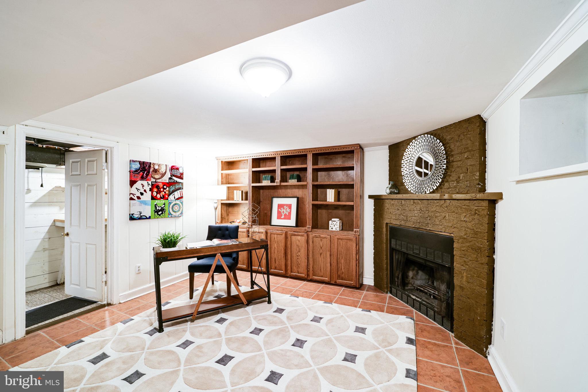 1126 Portner Road Alexandria, VA 22314 - Photo 22 of 26 Wood-burning fireplace and custom built-ins