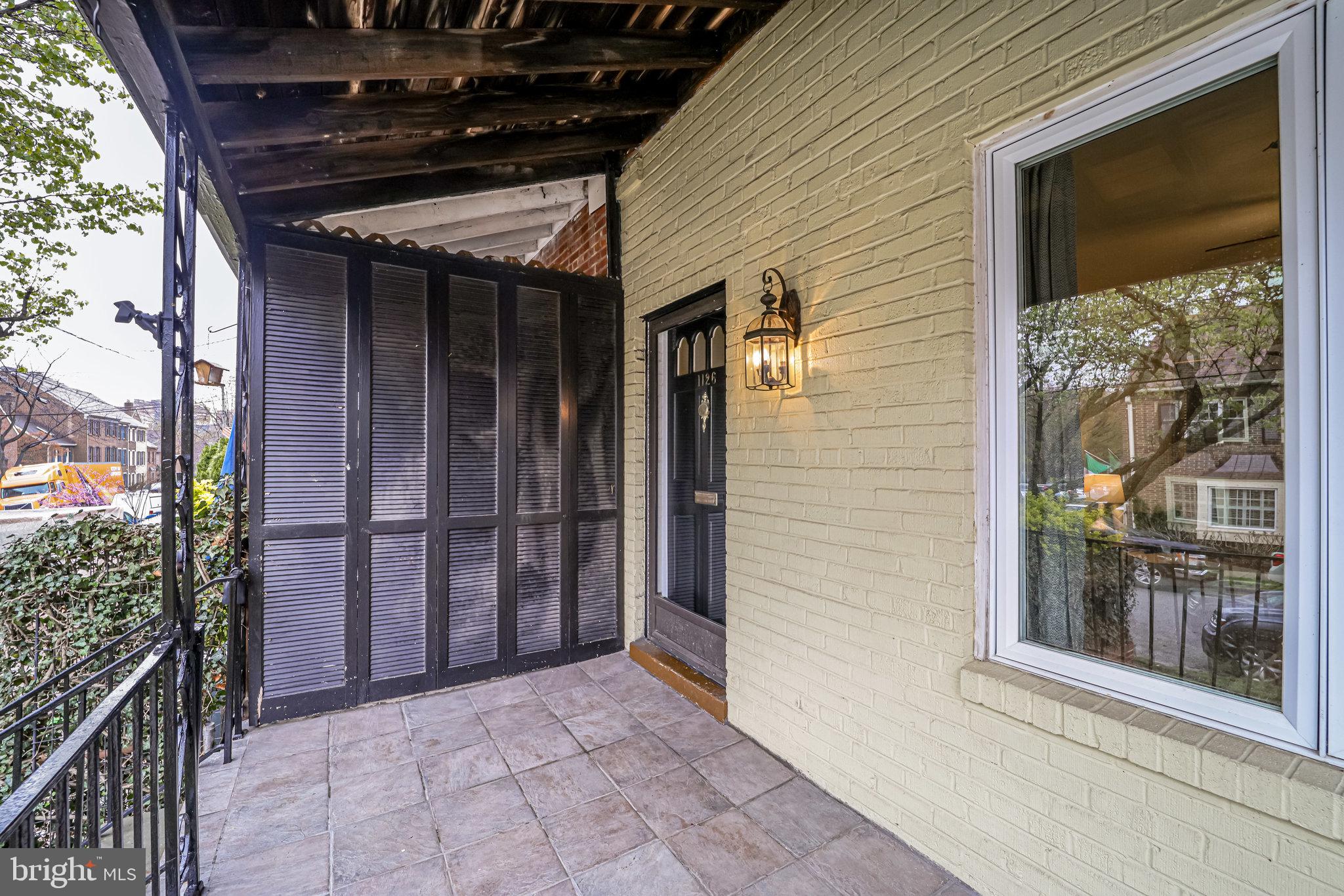 1126 Portner Road Alexandria, VA 22314 - Photo 3 of 26 Inviting front porch for lounging and decorating
