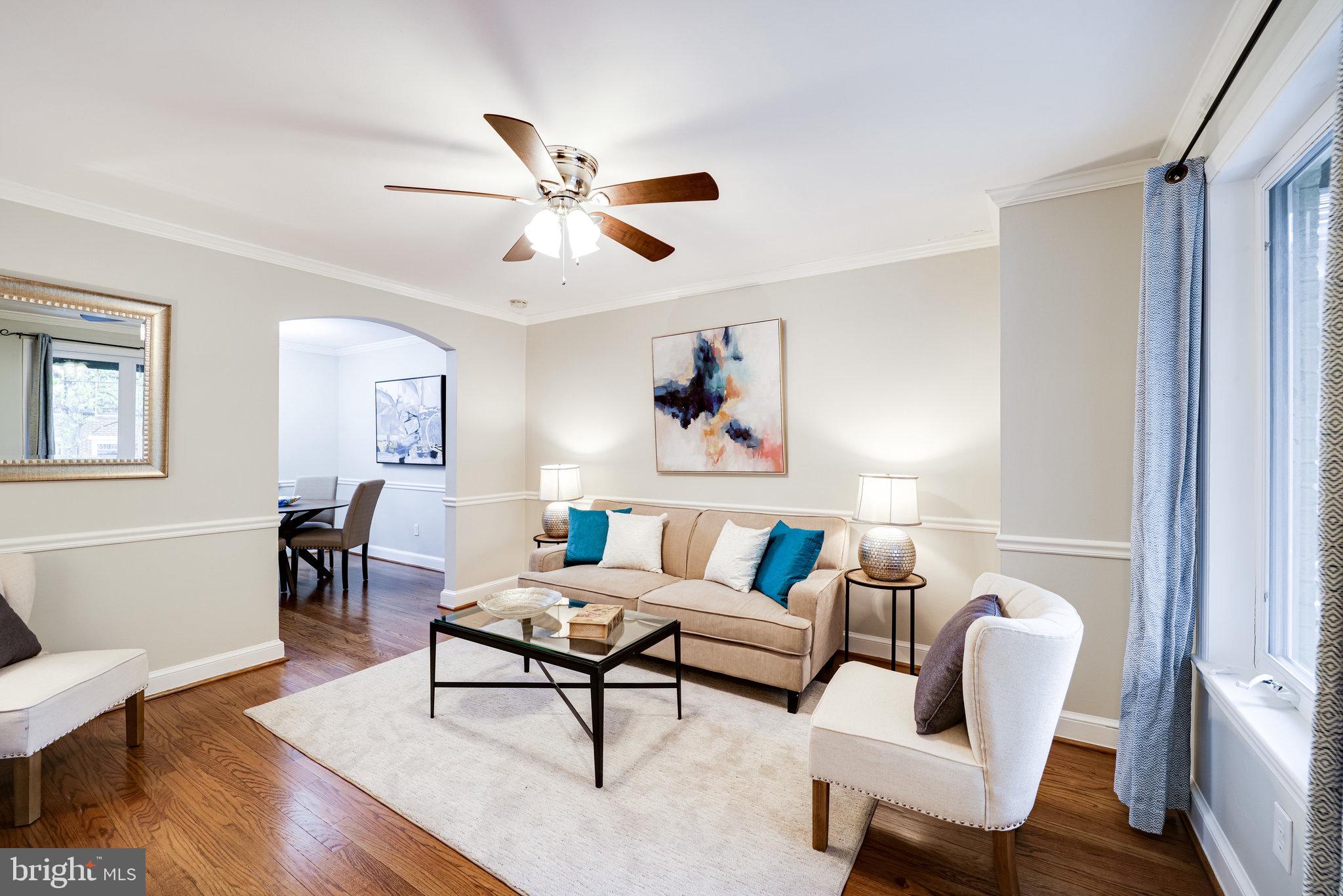 1126 Portner Road Alexandria, VA 22314 - Photo 4 of 26 Spacious living room w/ chair rail, crown molding